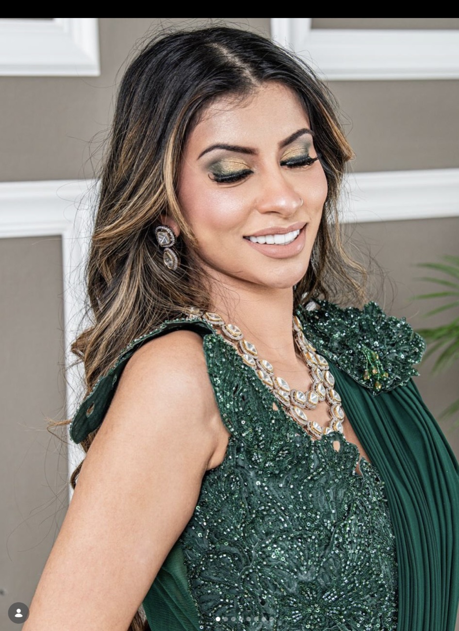 Editorial emerald green and gold glam studio portrait by Makeup by Nidari